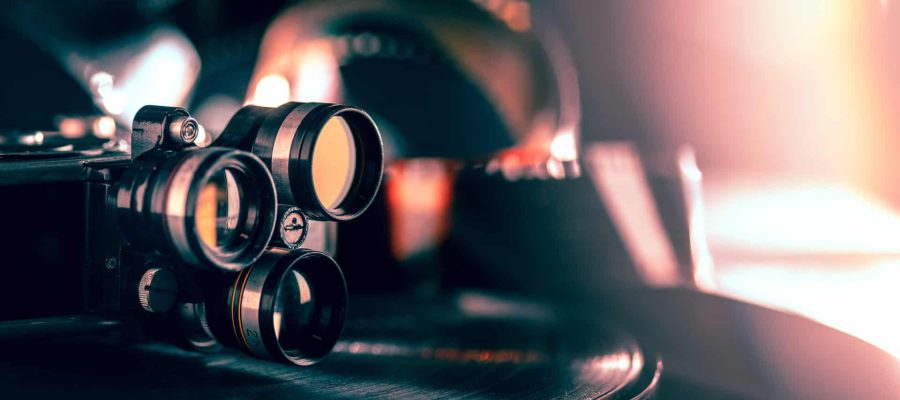 film-projector-dark-background-close-up-old-retro-things-shoot-with-vintage-style-colors-toned - Copy